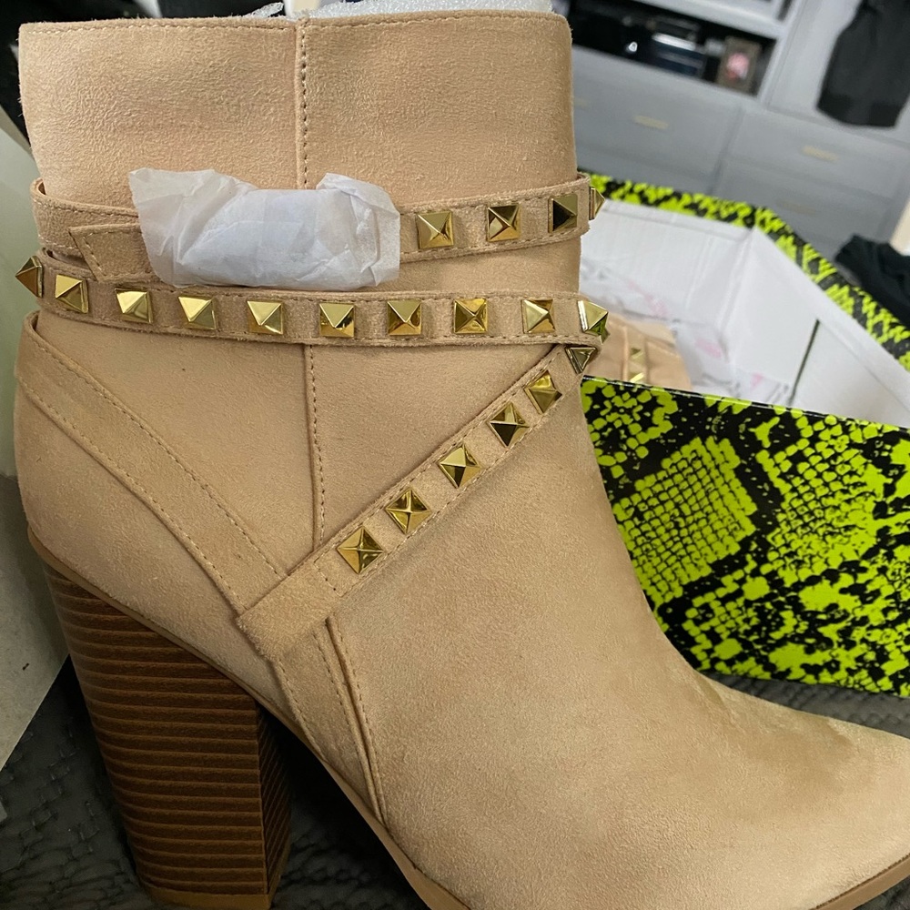 Brand new never worn studded boots size 10